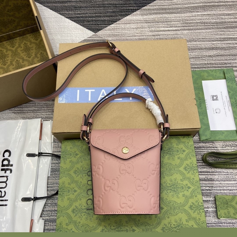 G*u*i top handle bags